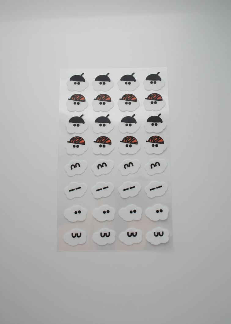 Set of small decorative items on a gray background