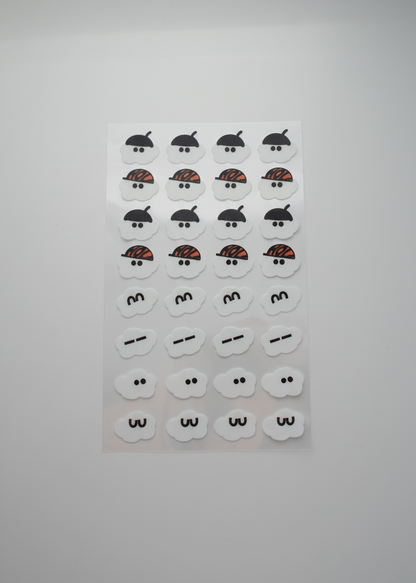 Set of small decorative items on a gray background